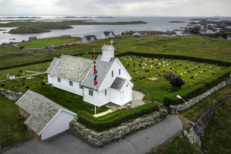 The church of Kvitsøy, with a view over the sea.